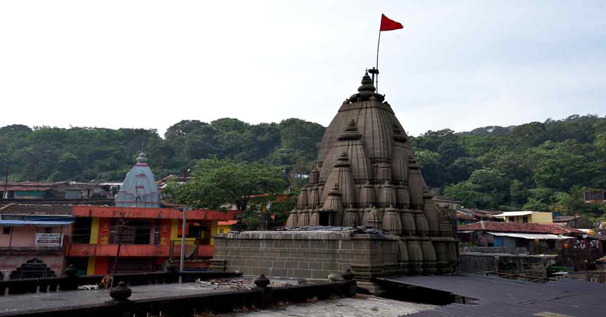 The Bhimashankar temple complex, surrounded by greenery and chirping birds. 